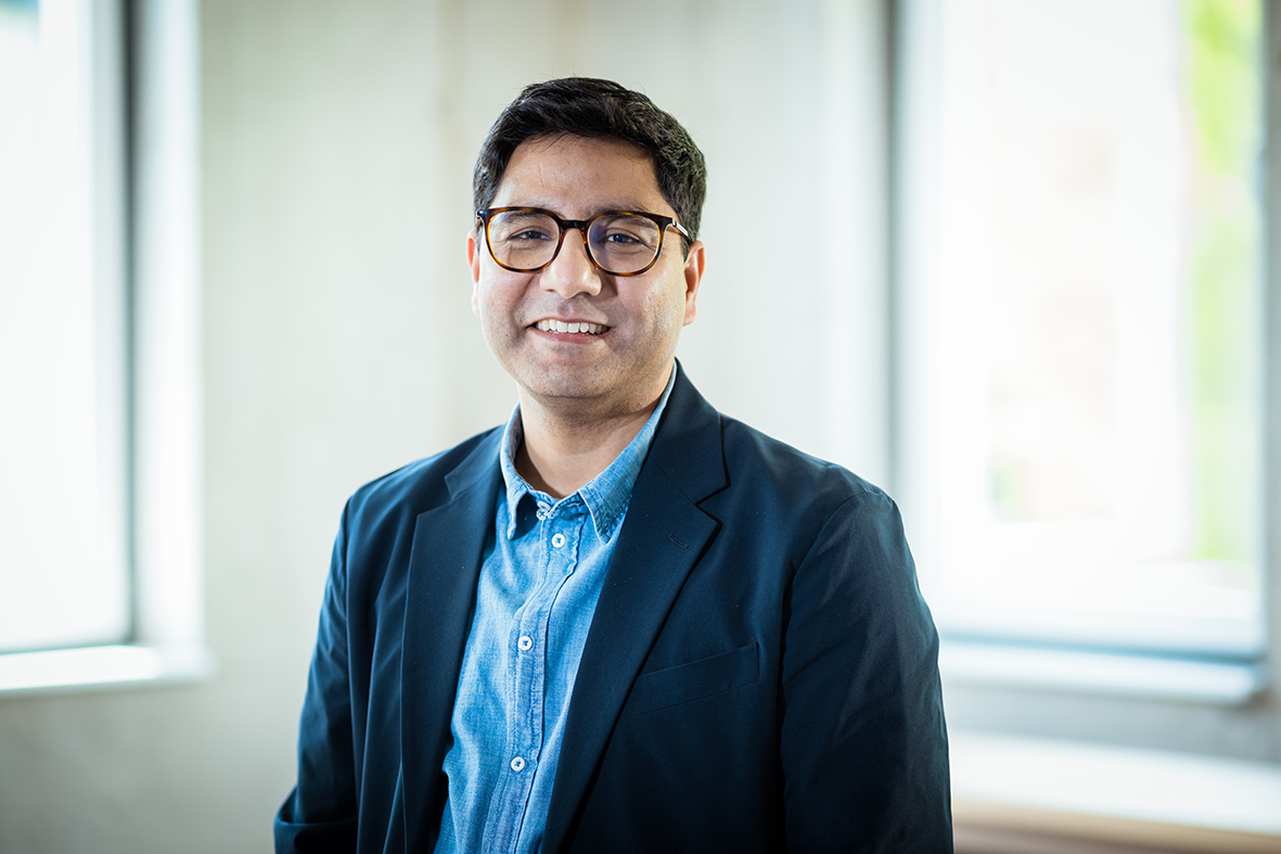 Portrait of Dr. Tanmaya Joshi, Executive VP of CDMO Services with a focus on radioactive radiopharmaceuticals, showcasing leadership and expertise.